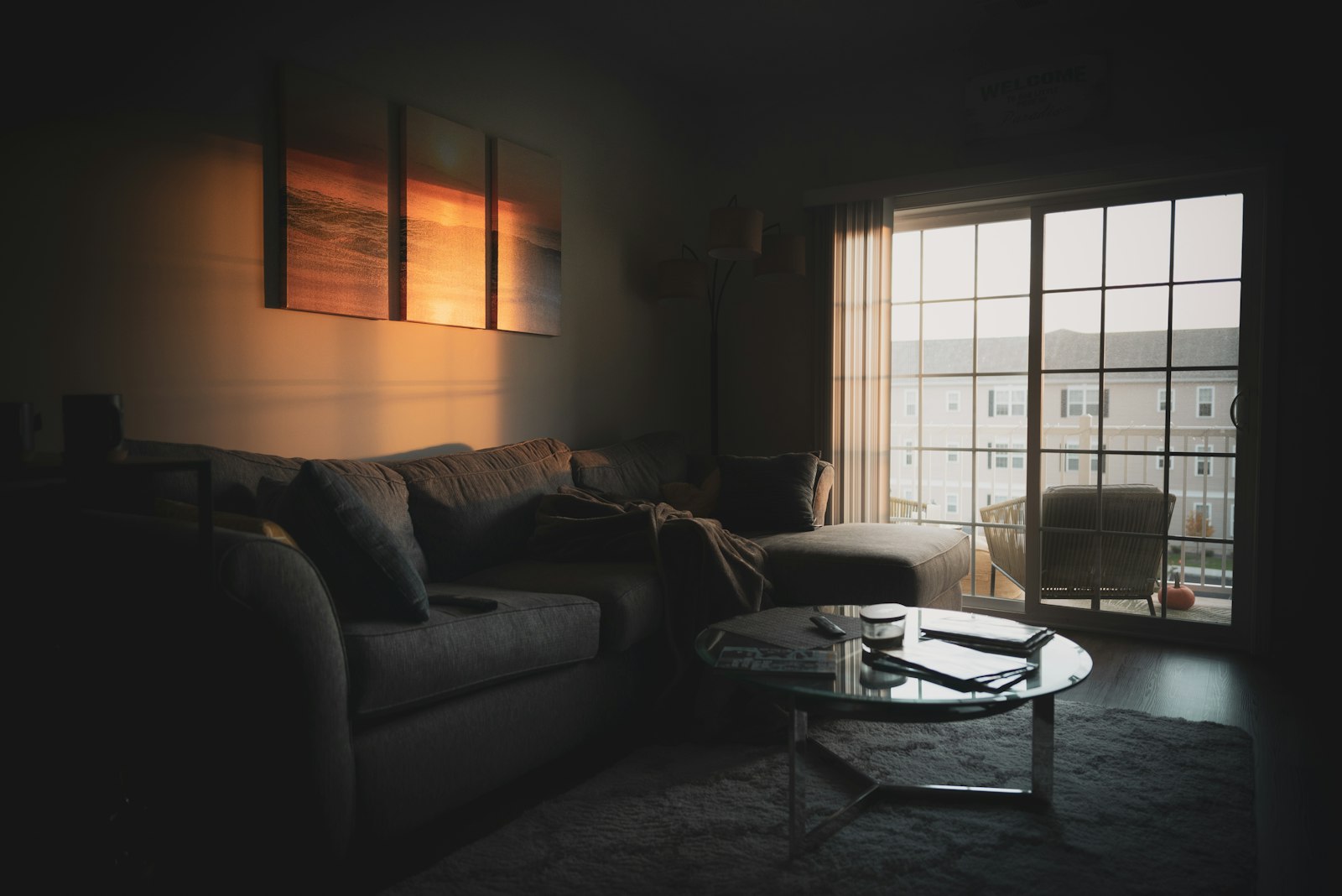 Empty office chair at a desk by a window