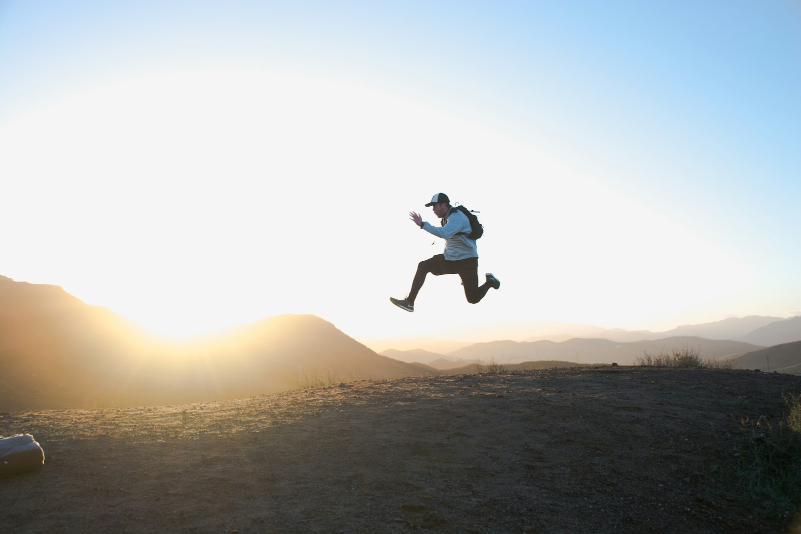 Runner on a road at dawn